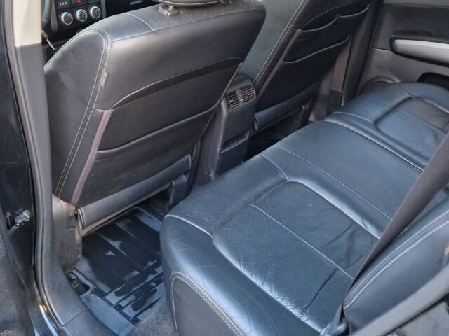 Черный Ниссан ИксТрейл, объемом двигателя 2.5 л и пробегом 340 тыс. км за 7299 $, фото 5 на Automoto.ua