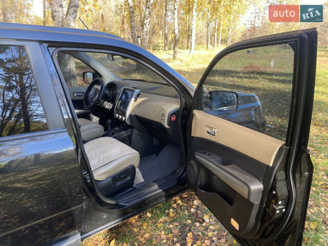 Черный Ниссан ИксТрейл, объемом двигателя 2 л и пробегом 214 тыс. км за 11500 $, фото 8 на Automoto.ua