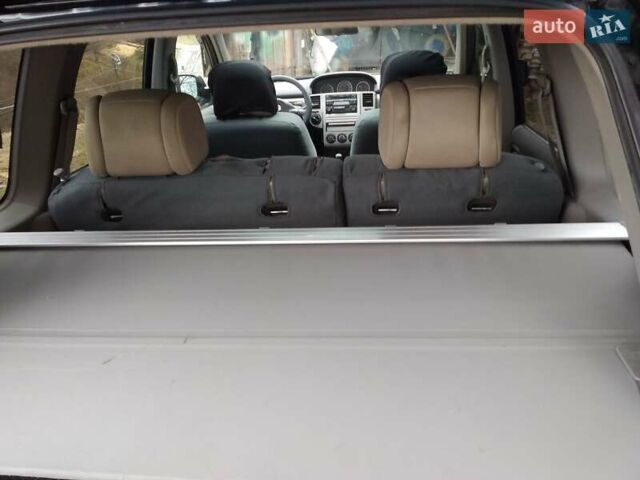 Чорний Ніссан ІксТрейл, об'ємом двигуна 2.2 л та пробігом 300 тис. км за 8281 $, фото 2 на Automoto.ua