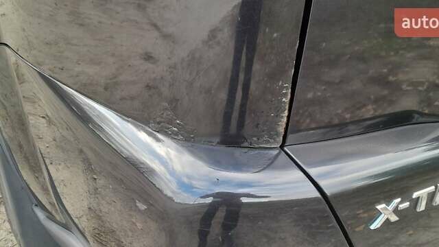 Черный Ниссан ИксТрейл, объемом двигателя 2 л и пробегом 259 тыс. км за 9999 $, фото 9 на Automoto.ua