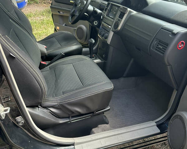 Чорний Ніссан ІксТрейл, об'ємом двигуна 2.49 л та пробігом 256 тис. км за 7000 $, фото 6 на Automoto.ua