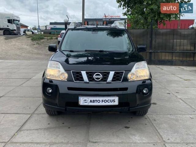 Черный Ниссан ИксТрейл, объемом двигателя 2 л и пробегом 295 тыс. км за 8090 $, фото 1 на Automoto.ua