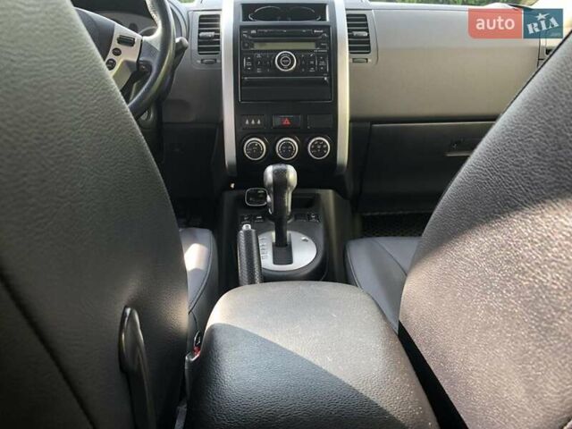 Черный Ниссан ИксТрейл, объемом двигателя 2 л и пробегом 140 тыс. км за 11600 $, фото 31 на Automoto.ua