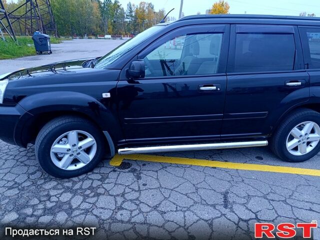 Черный Ниссан ИксТрейл, объемом двигателя 2.5 л и пробегом 170 тыс. км за 8600 $, фото 1 на Automoto.ua