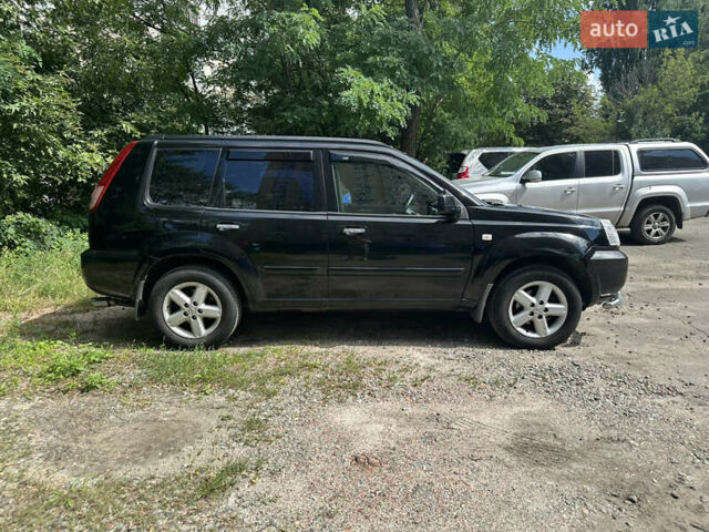 Чорний Ніссан ІксТрейл, об'ємом двигуна 2.49 л та пробігом 256 тис. км за 7000 $, фото 4 на Automoto.ua