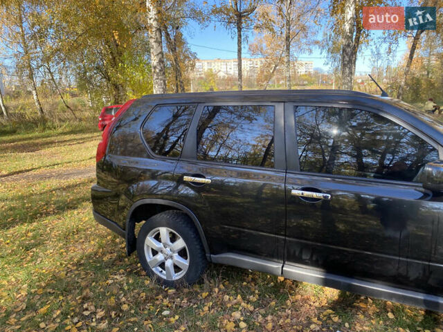 Черный Ниссан ИксТрейл, объемом двигателя 2 л и пробегом 214 тыс. км за 11500 $, фото 5 на Automoto.ua