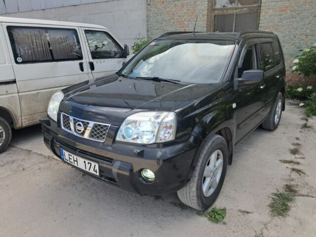 Черный Ниссан ИксТрейл, объемом двигателя 0 л и пробегом 290 тыс. км за 3950 $, фото 2 на Automoto.ua