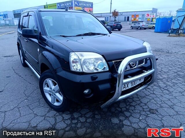 Черный Ниссан ИксТрейл, объемом двигателя 2.5 л и пробегом 170 тыс. км за 8600 $, фото 4 на Automoto.ua