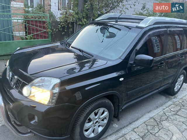 Черный Ниссан ИксТрейл, объемом двигателя 2.5 л и пробегом 236 тыс. км за 8600 $, фото 9 на Automoto.ua