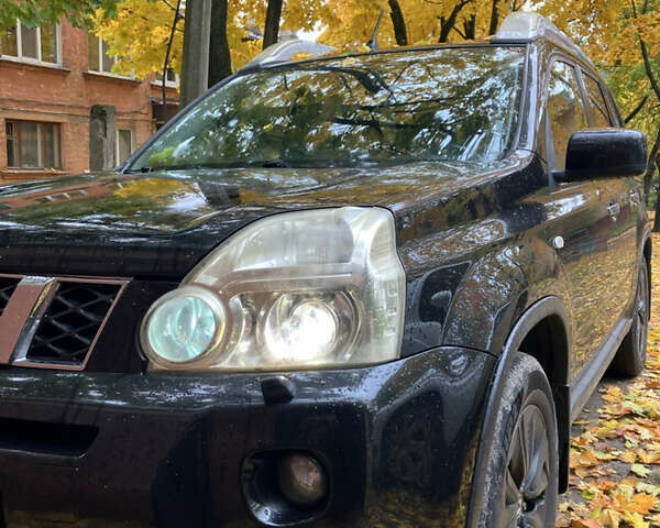 Черный Ниссан ИксТрейл, объемом двигателя 2 л и пробегом 257 тыс. км за 9147 $, фото 8 на Automoto.ua