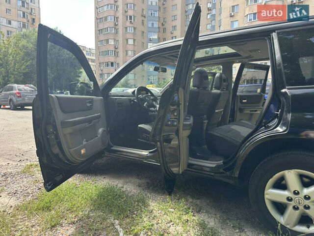 Чорний Ніссан ІксТрейл, об'ємом двигуна 2.49 л та пробігом 256 тис. км за 7000 $, фото 8 на Automoto.ua