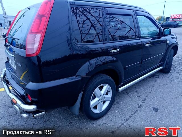 Черный Ниссан ИксТрейл, объемом двигателя 2.5 л и пробегом 170 тыс. км за 8600 $, фото 5 на Automoto.ua