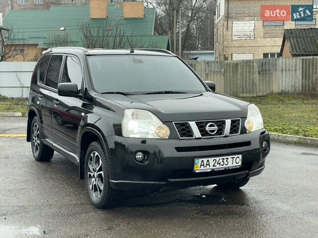 Черный Ниссан ИксТрейл, объемом двигателя 2 л и пробегом 210 тыс. км за 8750 $, фото 1 на Automoto.ua