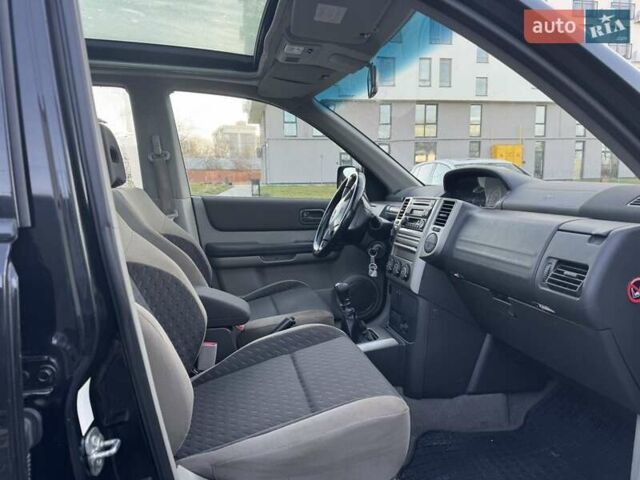 Чорний Ніссан ІксТрейл, об'ємом двигуна 2.2 л та пробігом 295 тис. км за 3850 $, фото 7 на Automoto.ua