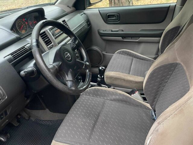 Чорний Ніссан ІксТрейл, об'ємом двигуна 2.2 л та пробігом 311 тис. км за 3500 $, фото 7 на Automoto.ua