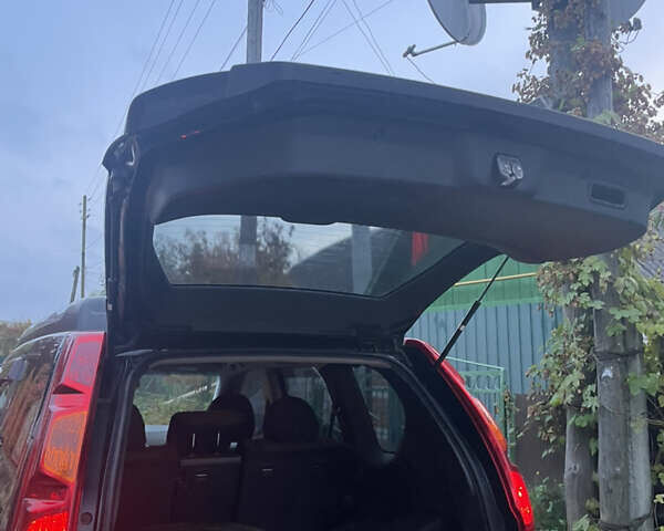 Черный Ниссан ИксТрейл, объемом двигателя 2.5 л и пробегом 236 тыс. км за 8600 $, фото 25 на Automoto.ua