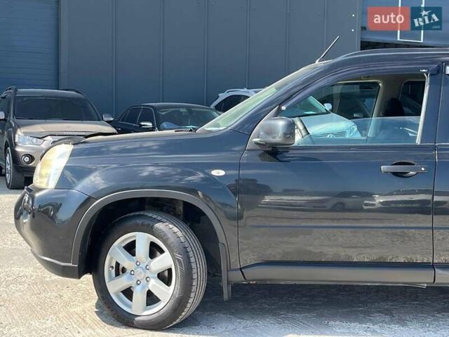 Черный Ниссан ИксТрейл, объемом двигателя 2 л и пробегом 279 тыс. км за 9240 $, фото 12 на Automoto.ua