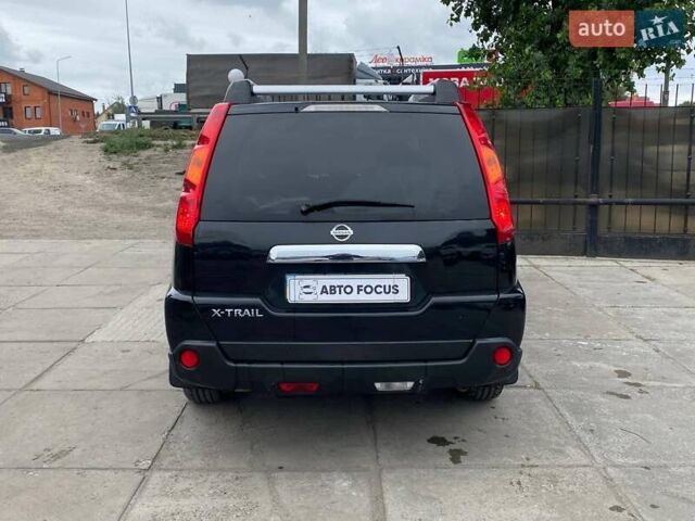Черный Ниссан ИксТрейл, объемом двигателя 2 л и пробегом 295 тыс. км за 8090 $, фото 5 на Automoto.ua