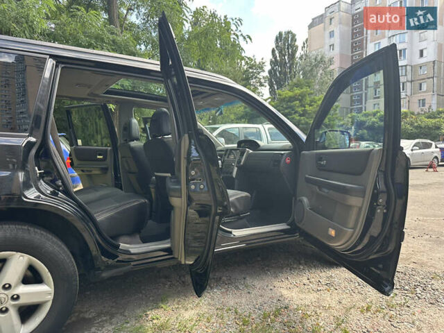 Чорний Ніссан ІксТрейл, об'ємом двигуна 2.49 л та пробігом 256 тис. км за 7000 $, фото 7 на Automoto.ua