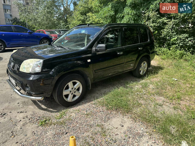 Чорний Ніссан ІксТрейл, об'ємом двигуна 2.49 л та пробігом 256 тис. км за 7000 $, фото 1 на Automoto.ua