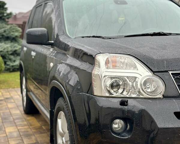 Черный Ниссан ИксТрейл, объемом двигателя 2 л и пробегом 264 тыс. км за 11250 $, фото 7 на Automoto.ua