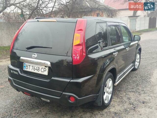 Черный Ниссан ИксТрейл, объемом двигателя 2.5 л и пробегом 197 тыс. км за 8500 $, фото 23 на Automoto.ua