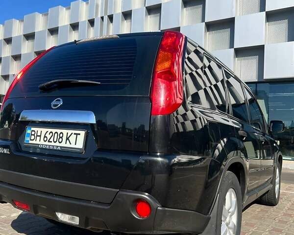 Черный Ниссан ИксТрейл, объемом двигателя 2 л и пробегом 190 тыс. км за 8700 $, фото 10 на Automoto.ua