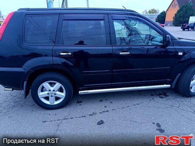 Черный Ниссан ИксТрейл, объемом двигателя 2.5 л и пробегом 170 тыс. км за 8600 $, фото 6 на Automoto.ua