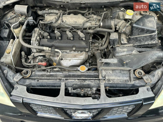 Чорний Ніссан ІксТрейл, об'ємом двигуна 2.49 л та пробігом 256 тис. км за 7000 $, фото 23 на Automoto.ua