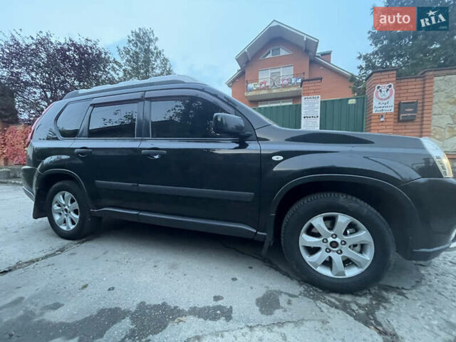 Черный Ниссан ИксТрейл, объемом двигателя 2.5 л и пробегом 236 тыс. км за 8600 $, фото 3 на Automoto.ua