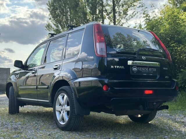 Черный Ниссан ИксТрейл, объемом двигателя 2.2 л и пробегом 208 тыс. км за 3799 $, фото 3 на Automoto.ua