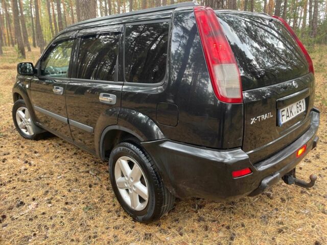 Чорний Ніссан ІксТрейл, об'ємом двигуна 2.2 л та пробігом 311 тис. км за 3500 $, фото 2 на Automoto.ua