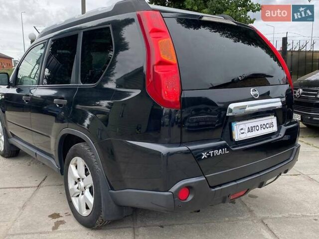 Черный Ниссан ИксТрейл, объемом двигателя 2 л и пробегом 295 тыс. км за 8090 $, фото 7 на Automoto.ua