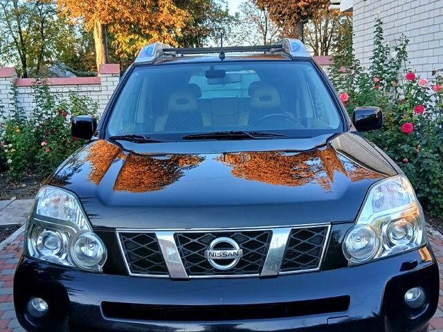 Чорний Ніссан ІксТрейл, об'ємом двигуна 2 л та пробігом 330 тис. км за 9300 $, фото 2 на Automoto.ua