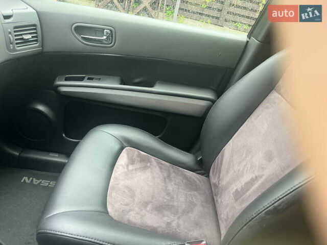 Черный Ниссан ИксТрейл, объемом двигателя 2 л и пробегом 175 тыс. км за 11500 $, фото 8 на Automoto.ua