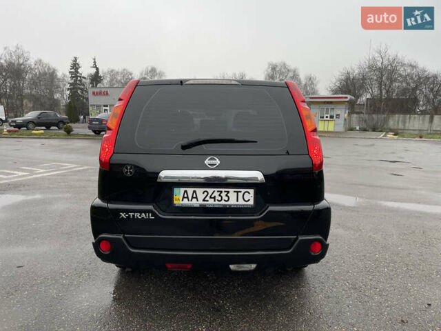 Черный Ниссан ИксТрейл, объемом двигателя 2 л и пробегом 210 тыс. км за 8750 $, фото 8 на Automoto.ua
