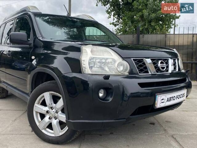 Черный Ниссан ИксТрейл, объемом двигателя 2 л и пробегом 295 тыс. км за 8090 $, фото 3 на Automoto.ua