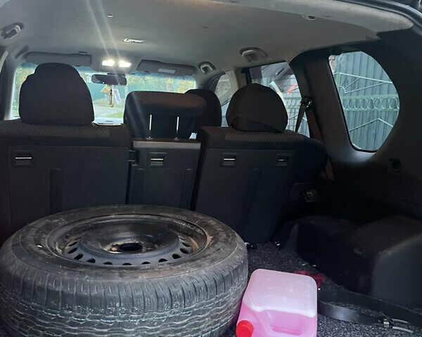 Черный Ниссан ИксТрейл, объемом двигателя 2.5 л и пробегом 236 тыс. км за 8600 $, фото 24 на Automoto.ua