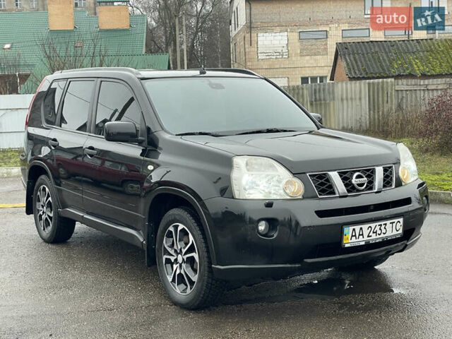 Черный Ниссан ИксТрейл, объемом двигателя 2 л и пробегом 210 тыс. км за 8750 $, фото 19 на Automoto.ua