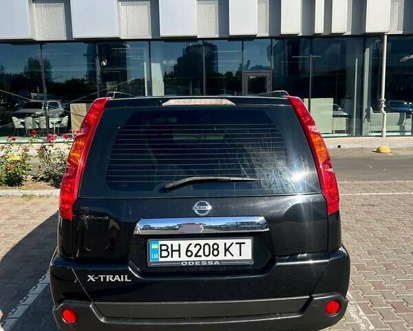 Черный Ниссан ИксТрейл, объемом двигателя 2 л и пробегом 190 тыс. км за 8700 $, фото 12 на Automoto.ua