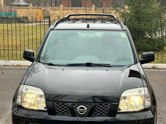 Черный Ниссан ИксТрейл, объемом двигателя 2.2 л и пробегом 180 тыс. км за 3358 $, фото 1 на Automoto.ua