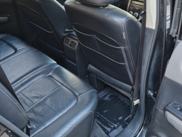 Черный Ниссан ИксТрейл, объемом двигателя 2.5 л и пробегом 340 тыс. км за 7299 $, фото 7 на Automoto.ua