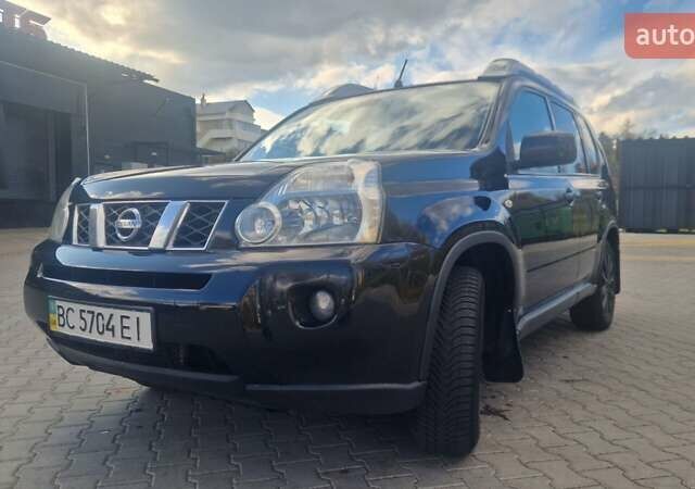 Чорний Ніссан ІксТрейл, об'ємом двигуна 2 л та пробігом 333 тис. км за 7450 $, фото 2 на Automoto.ua