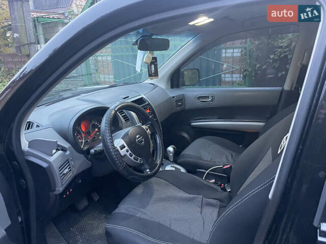 Черный Ниссан ИксТрейл, объемом двигателя 2.5 л и пробегом 236 тыс. км за 8600 $, фото 10 на Automoto.ua