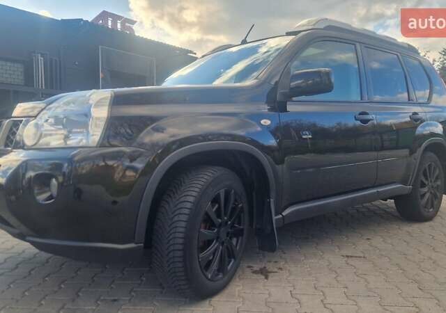 Чорний Ніссан ІксТрейл, об'ємом двигуна 2 л та пробігом 333 тис. км за 7450 $, фото 5 на Automoto.ua