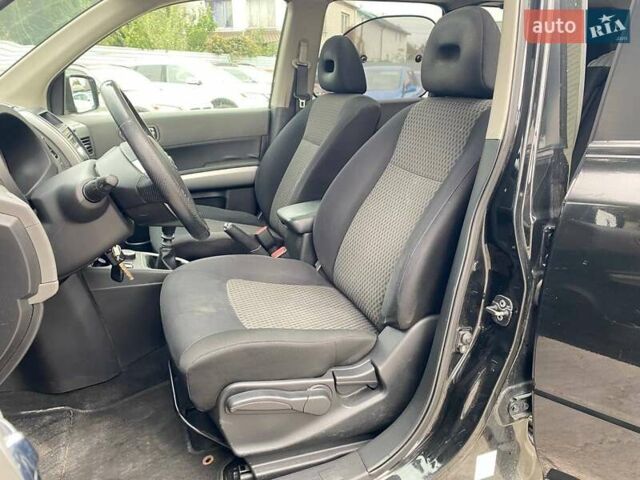 Черный Ниссан ИксТрейл, объемом двигателя 2 л и пробегом 295 тыс. км за 8090 $, фото 8 на Automoto.ua