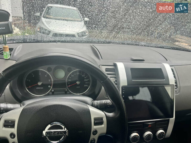 Черный Ниссан ИксТрейл, объемом двигателя 2 л и пробегом 175 тыс. км за 11500 $, фото 5 на Automoto.ua