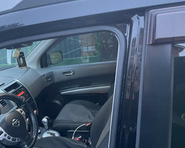 Черный Ниссан ИксТрейл, объемом двигателя 2.5 л и пробегом 236 тыс. км за 8600 $, фото 17 на Automoto.ua