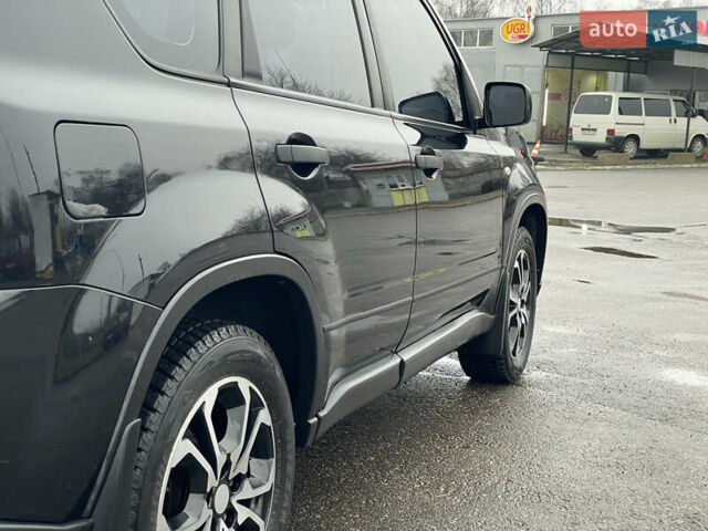 Черный Ниссан ИксТрейл, объемом двигателя 2 л и пробегом 210 тыс. км за 8750 $, фото 12 на Automoto.ua