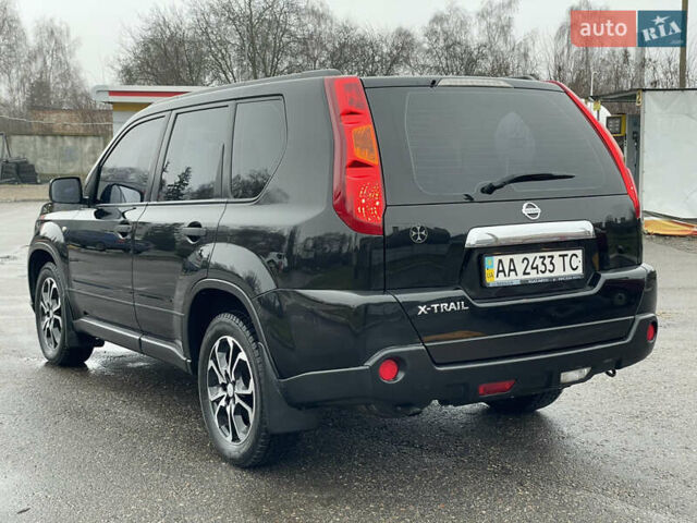 Черный Ниссан ИксТрейл, объемом двигателя 2 л и пробегом 210 тыс. км за 8750 $, фото 7 на Automoto.ua